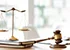 Business and lawyers discussing contract papers with brass scale on desk in office. Law, legal services, advice, justice and law concept picture with film grain effect