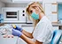 Dental technician making dentures. Dental prosthesis, prosthetics work.